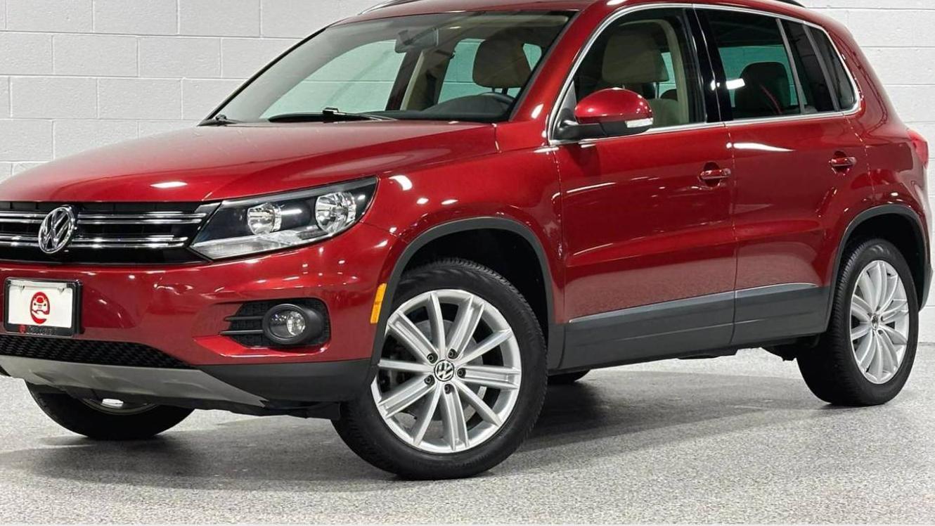 VOLKSWAGEN TIGUAN 2014 WVGBV3AX7EW069145 image