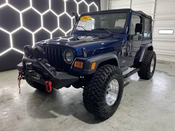 JEEP WRANGLER 2002 1J4FA39SX2P714025 image