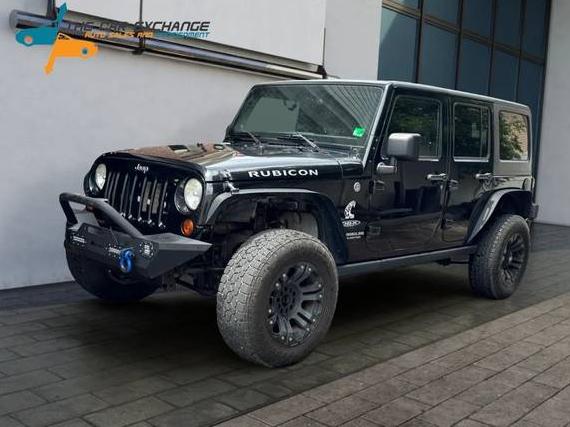 JEEP WRANGLER 2011 1J4HA6H13BL516087 image