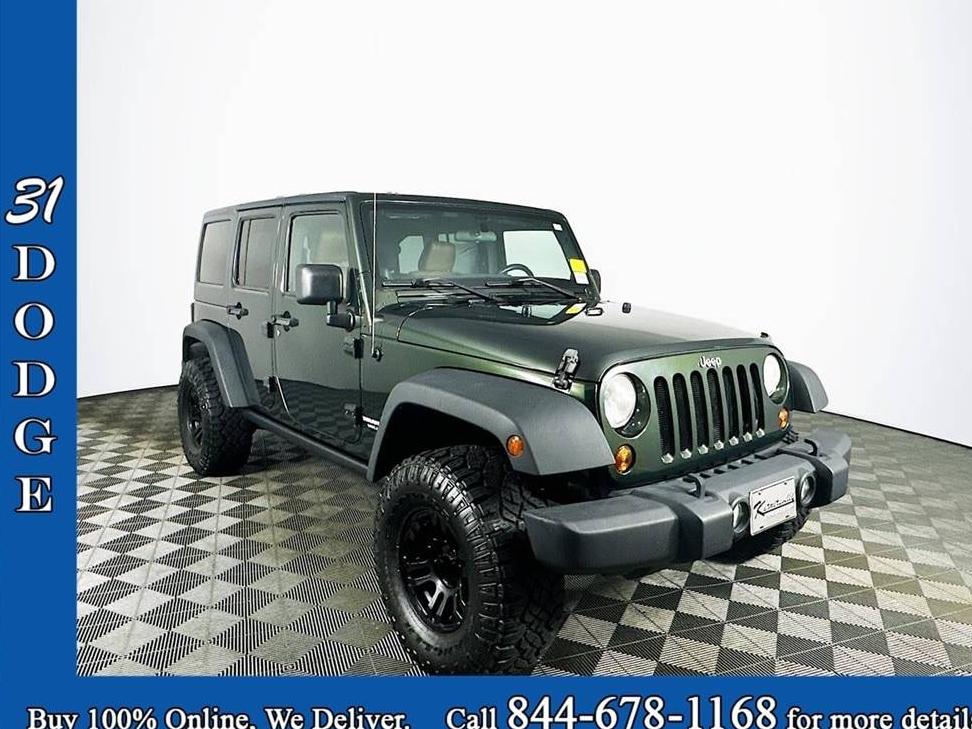 JEEP WRANGLER 2011 1J4HA6H13BL580906 image