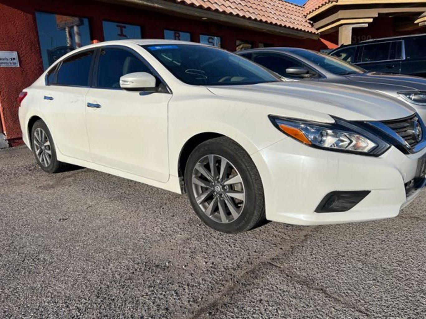 NISSAN ALTIMA 2016 1N4AL3AP3GC131673 image