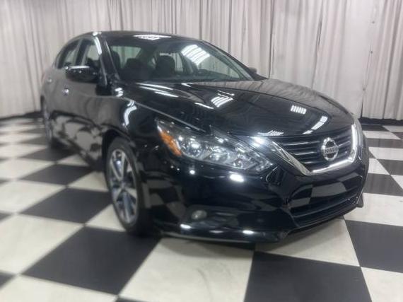 NISSAN ALTIMA 2016 1N4AL3AP0GC284169 image