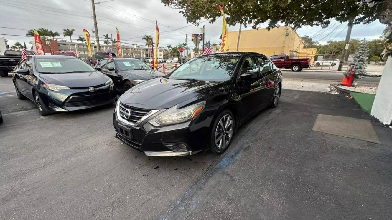 NISSAN ALTIMA 2018 1N4AL3AP3JC208386 image