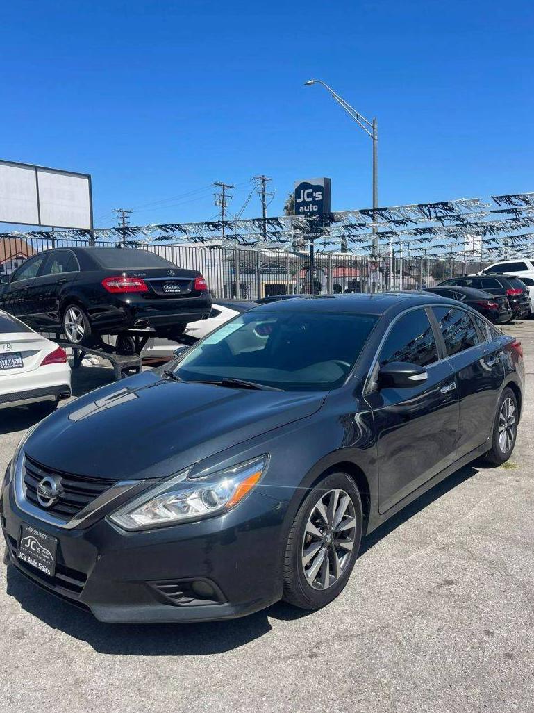 NISSAN ALTIMA 2017 1N4AL3AP7HC186886 image