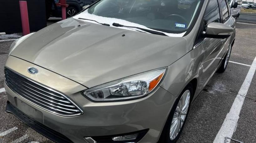 FORD FOCUS 2016 1FADP3N21GL259930 image