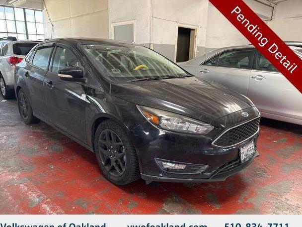 FORD FOCUS 2016 1FADP3F22GL289484 image