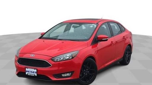 FORD FOCUS 2016 1FADP3F22GL329935 image