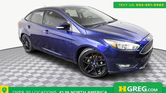 FORD FOCUS 2016 1FADP3F24GL407261 image