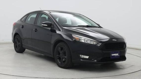 FORD FOCUS 2016 1FADP3FE4GL392884 image