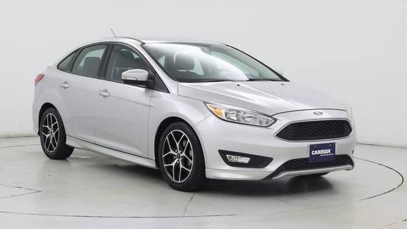 FORD FOCUS 2016 1FADP3F26GL394853 image