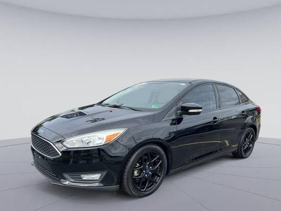 FORD FOCUS 2016 1FADP3F25GL400707 image