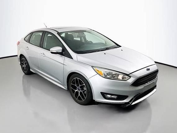 FORD FOCUS 2016 1FADP3F22GL221069 image