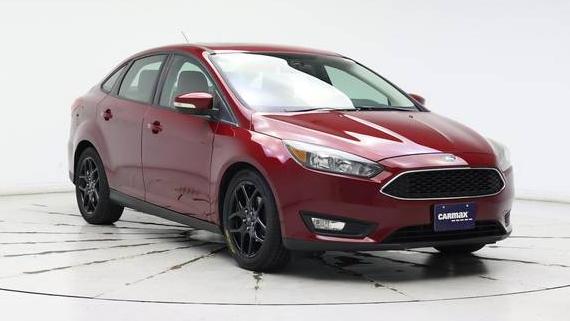 FORD FOCUS 2016 1FADP3F26GL299113 image