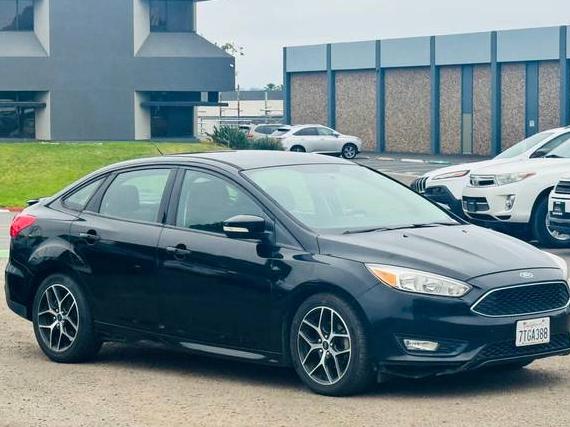 FORD FOCUS 2016 1FADP3F24GL225589 image