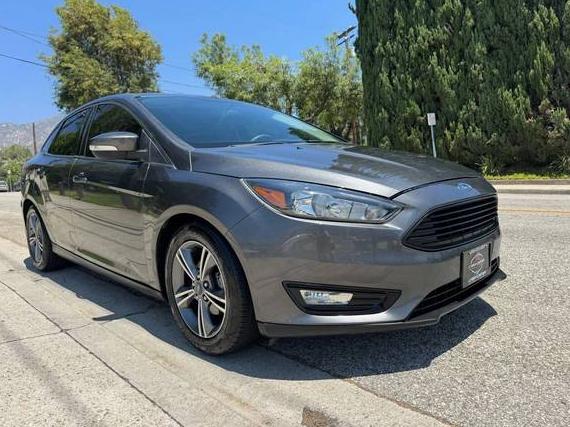 FORD FOCUS 2016 1FADP3FE4GL379942 image