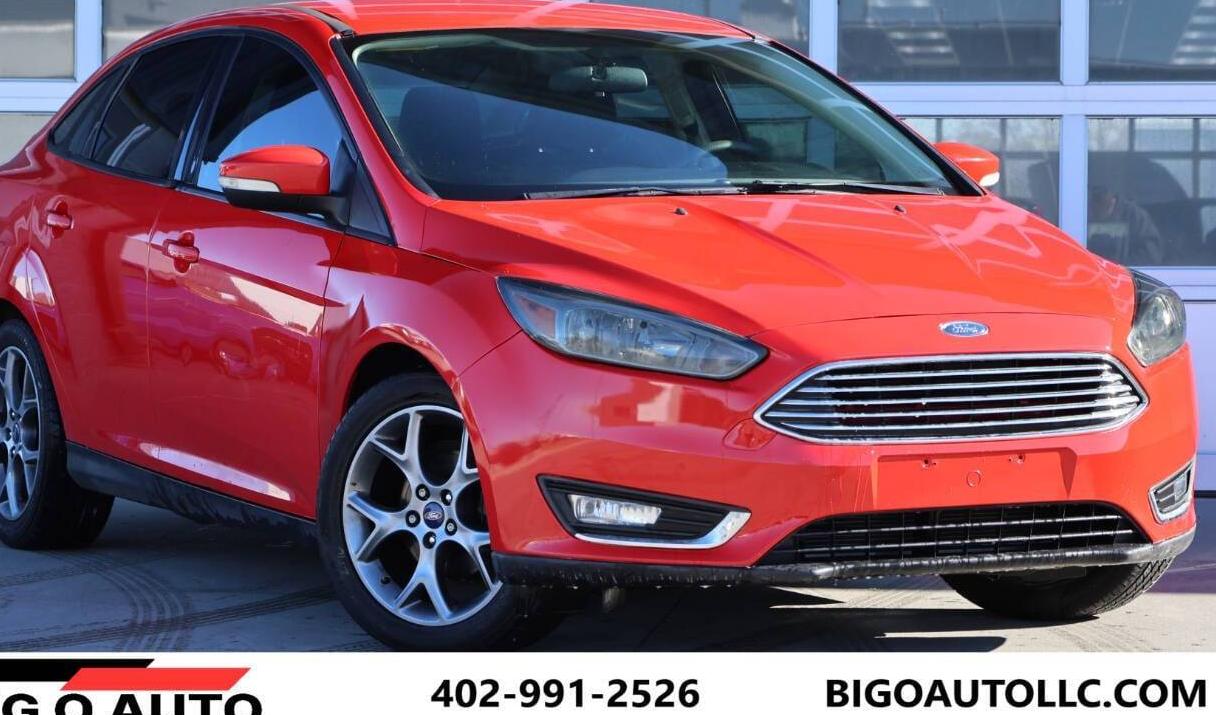 FORD FOCUS 2016 1FADP3F27GL404984 image