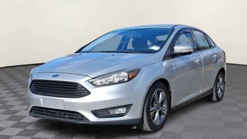 FORD FOCUS 2016 1FADP3FE6GL240329 image