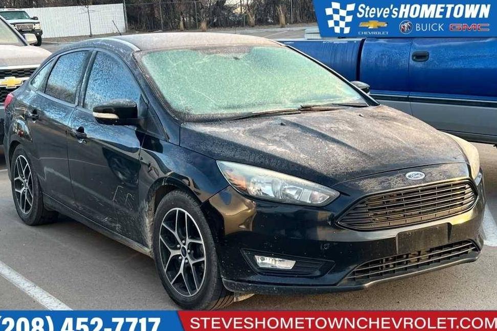 FORD FOCUS 2016 1FADP3FE3GL311275 image