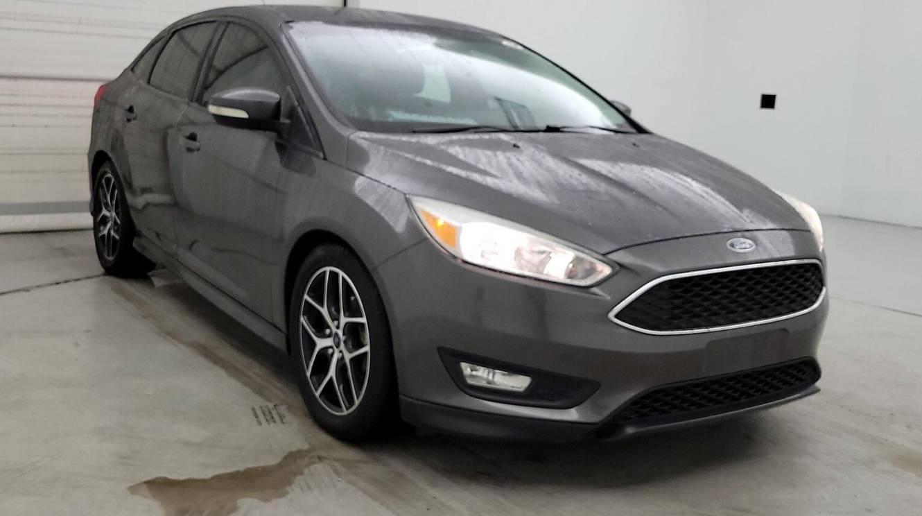 FORD FOCUS 2016 1FADP3F26GL301605 image