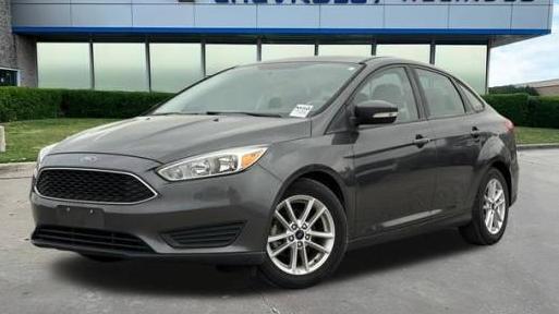 FORD FOCUS 2016 1FADP3F27GL373803 image