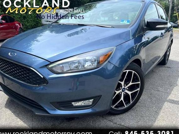 FORD FOCUS 2018 1FADP3M28JL264230 image