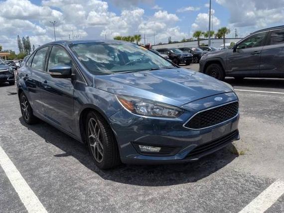 FORD FOCUS 2018 1FADP3H21JL299718 image