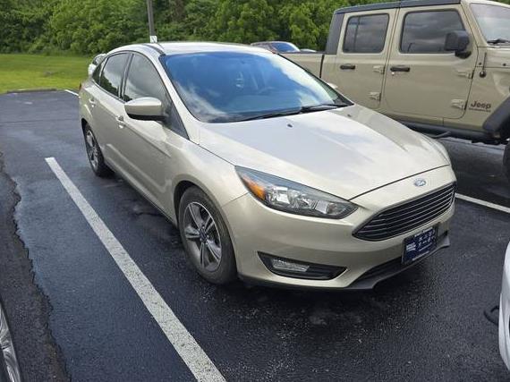 FORD FOCUS 2018 1FADP3FE8JL210708 image