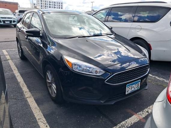 FORD FOCUS 2018 1FADP3FE4JL240921 image
