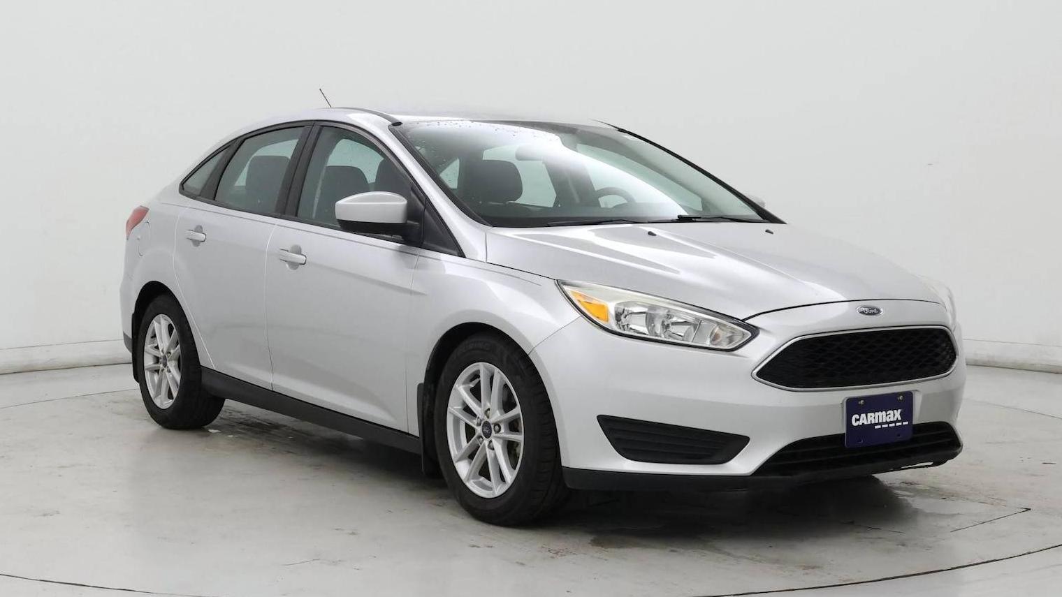 FORD FOCUS 2018 1FADP3FE9JL307528 image