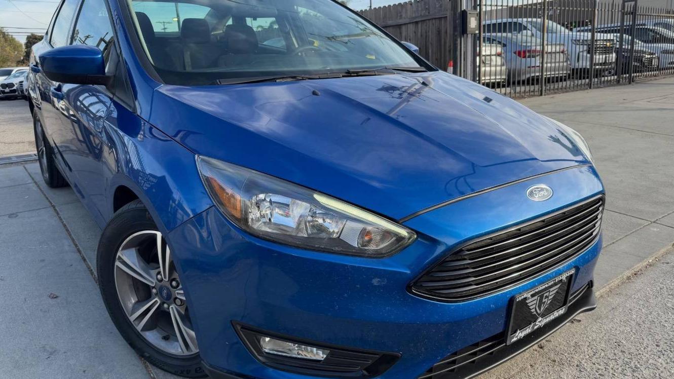 FORD FOCUS 2018 1FADP3FE9JL271193 image