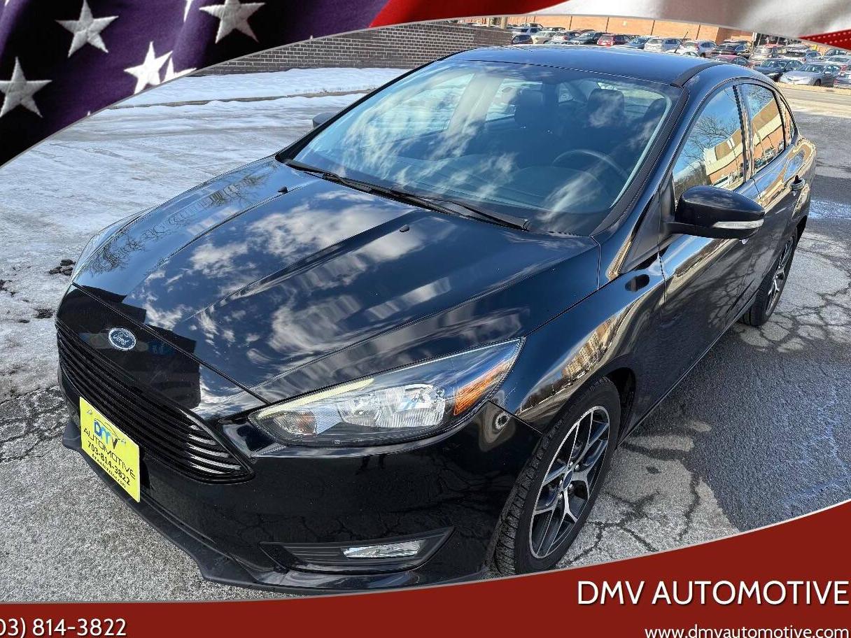 FORD FOCUS 2018 1FADP3F22JL209852 image