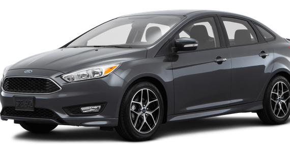 FORD FOCUS 2018 1FADP3F21JL328380 image