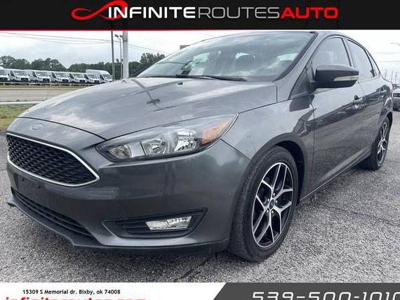FORD FOCUS 2018 1FADP3H28JL244263 image