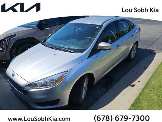 FORD FOCUS 2018 1FADP3F22JL256198 image
