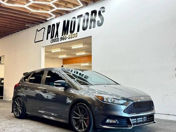 FORD FOCUS 2018 1FADP3L9XJL260629 image