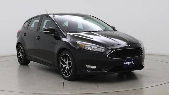 FORD FOCUS 2018 1FADP3M28JL297972 image