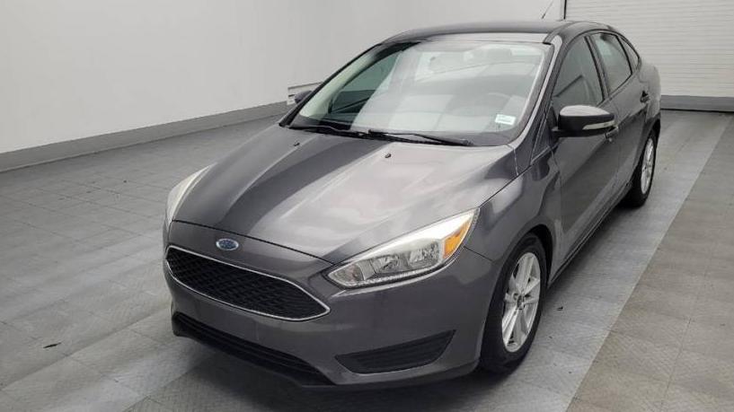 FORD FOCUS 2018 1FADP3FE6JL301962 image