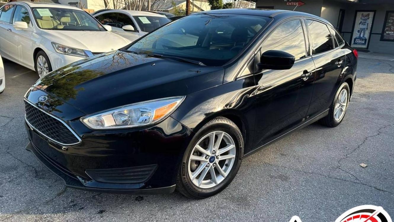 FORD FOCUS 2018 1FADP3FE2JL229223 image