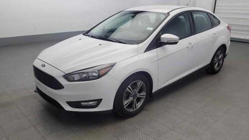 FORD FOCUS 2018 1FADP3FE7JL320469 image