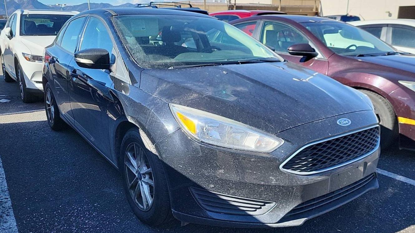 FORD FOCUS 2018 1FADP3FE9JL293131 image