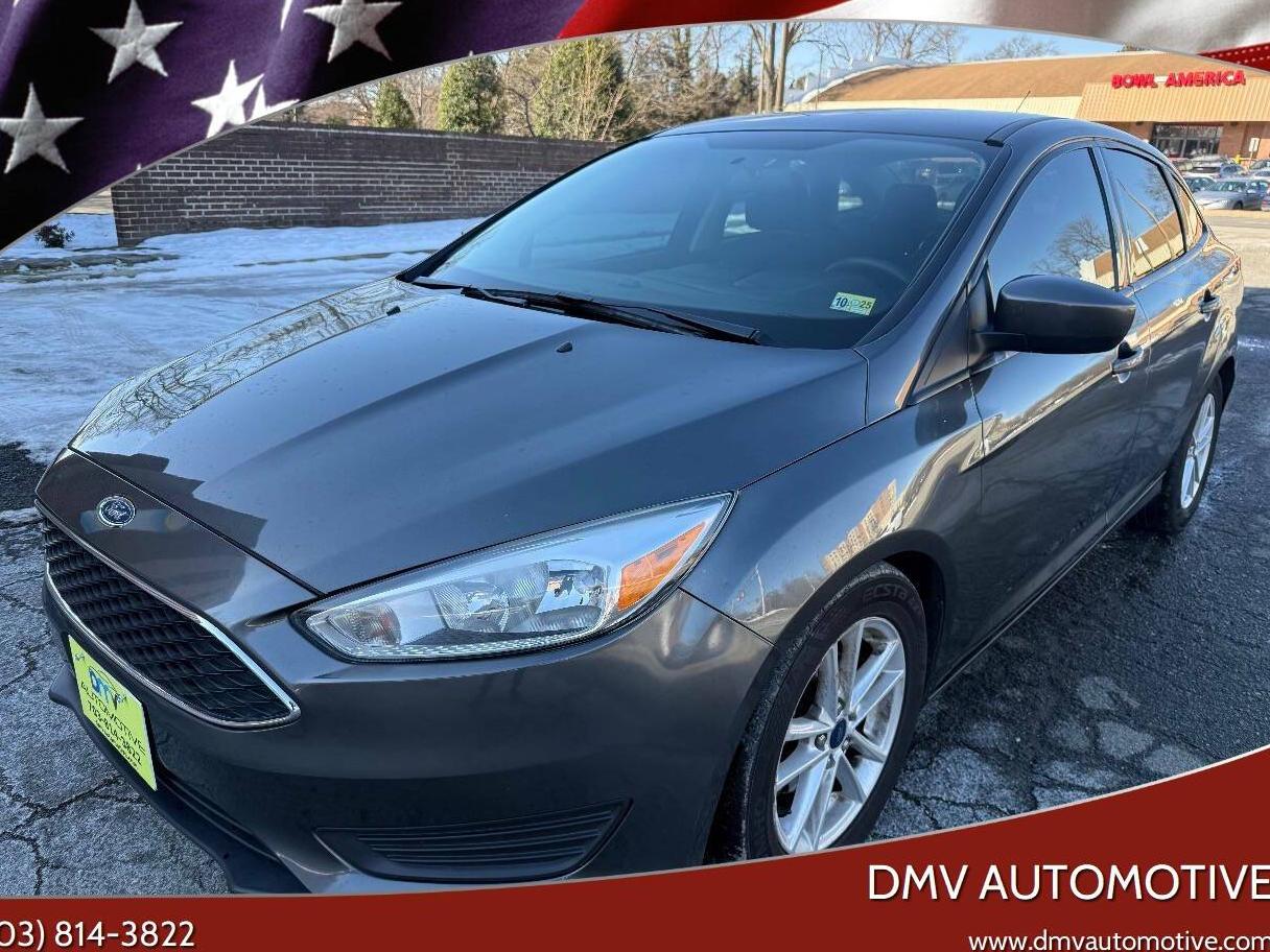 FORD FOCUS 2018 1FADP3FE2JL243204 image