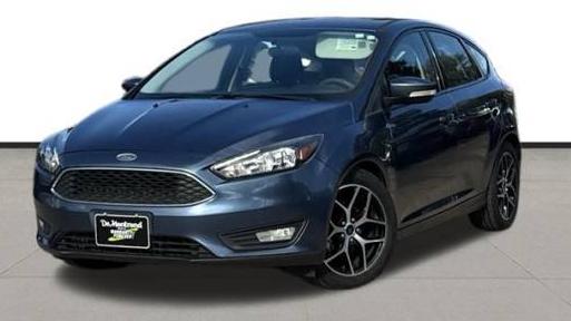 FORD FOCUS 2018 1FADP3M23JL244077 image