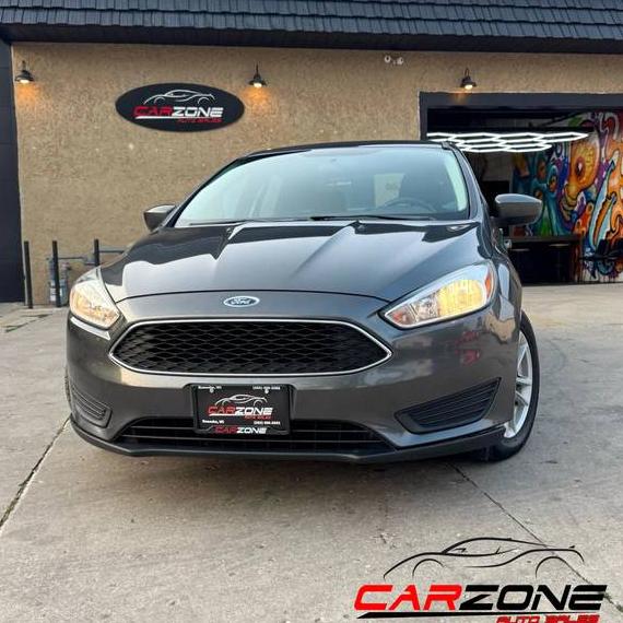 FORD FOCUS 2018 1FADP3F27JL300664 image