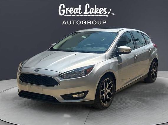 FORD FOCUS 2018 1FADP3M24JL239664 image