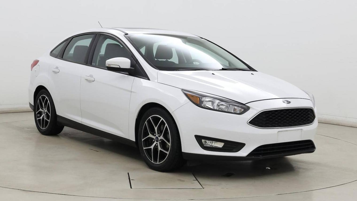 FORD FOCUS 2018 1FADP3H22JL210142 image