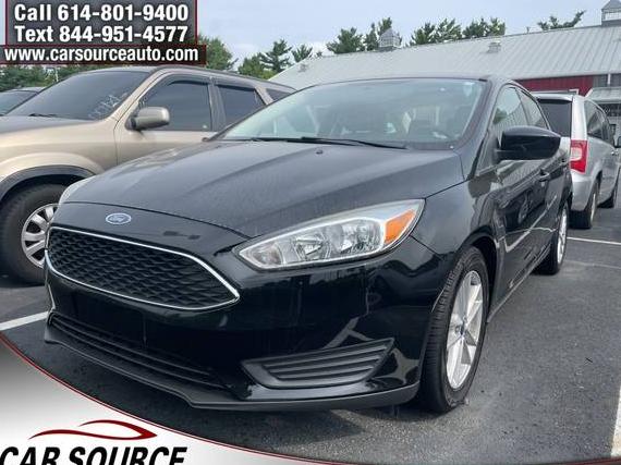 FORD FOCUS 2018 1FADP3FE2JL310495 image