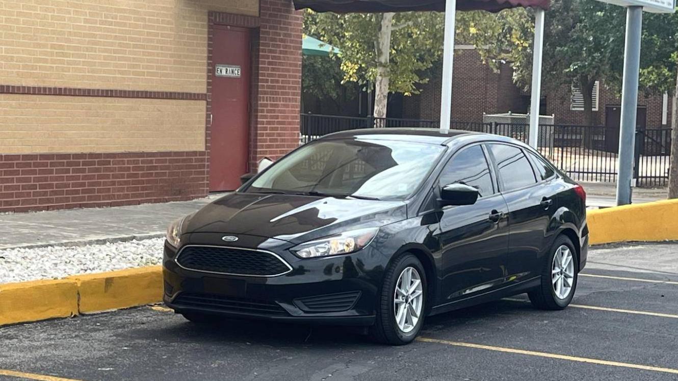 FORD FOCUS 2018 1FADP3F29JL209363 image