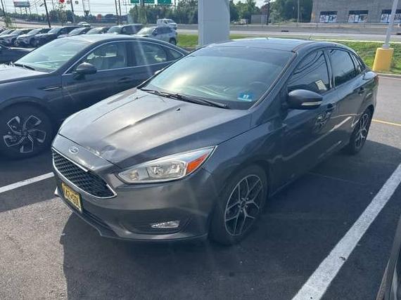 FORD FOCUS 2018 1FADP3H22JL214014 image