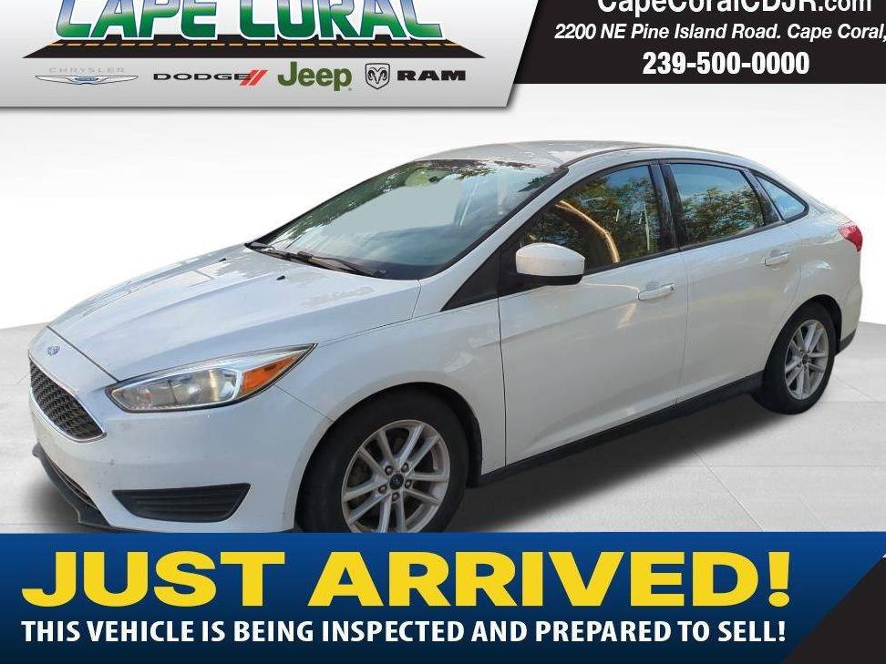 FORD FOCUS 2018 1FADP3FE7JL266042 image