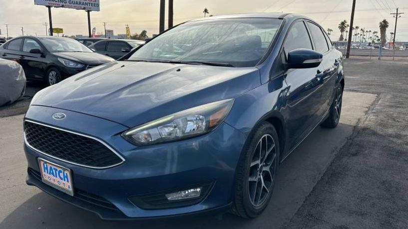 FORD FOCUS 2018 1FADP3H24JL244843 image